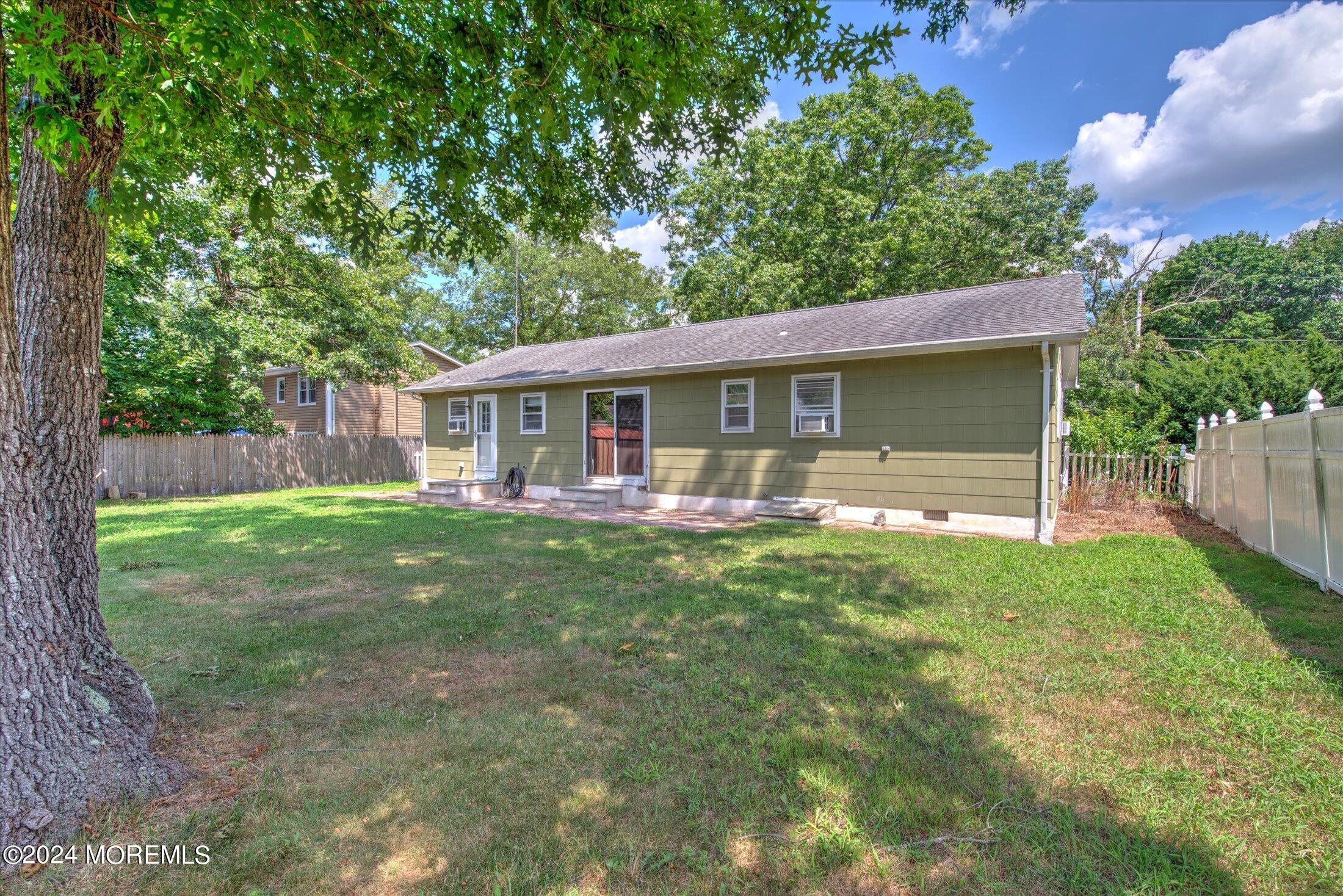 2209 Glen Oak Drive Forked River, NJ 08731 - Photo 40 of 44 front view of a house with a yard