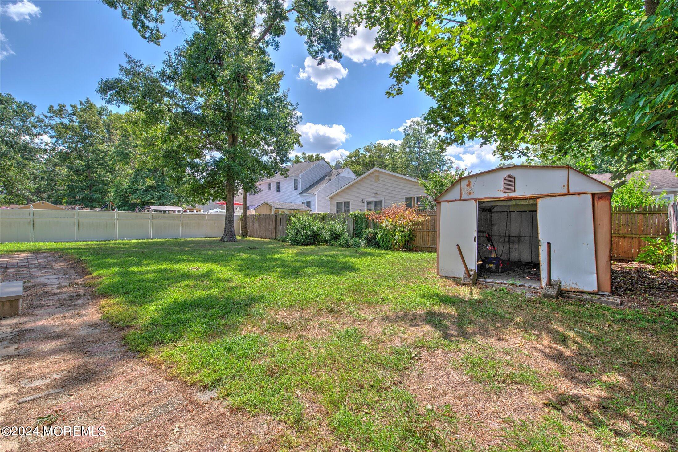 2209 Glen Oak Drive Forked River, NJ 08731 - Photo 43 of 44 a view of a house with a yard