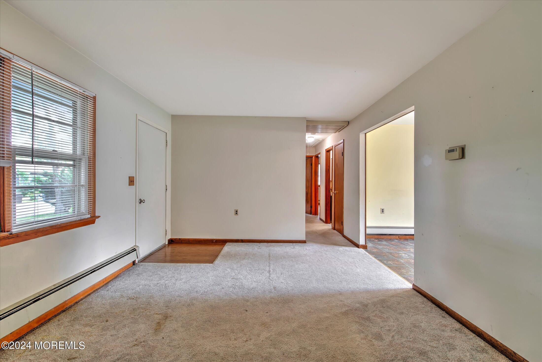 2209 Glen Oak Drive Forked River, NJ 08731 - Photo 7 of 44 a view of an empty room with a window