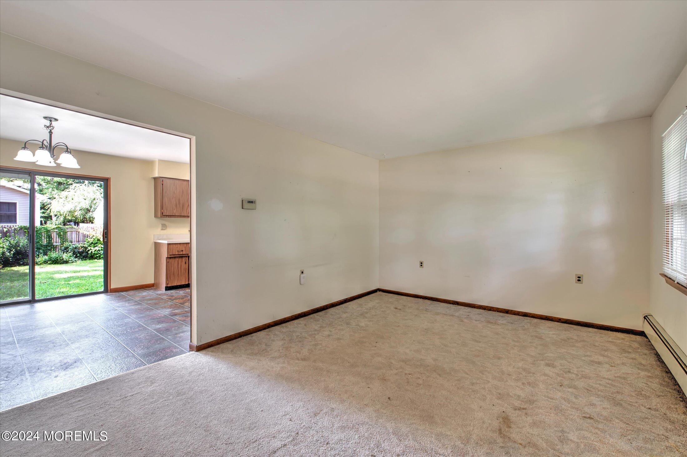 2209 Glen Oak Drive Forked River, NJ 08731 - Photo 8 of 44 a view of an empty room with window