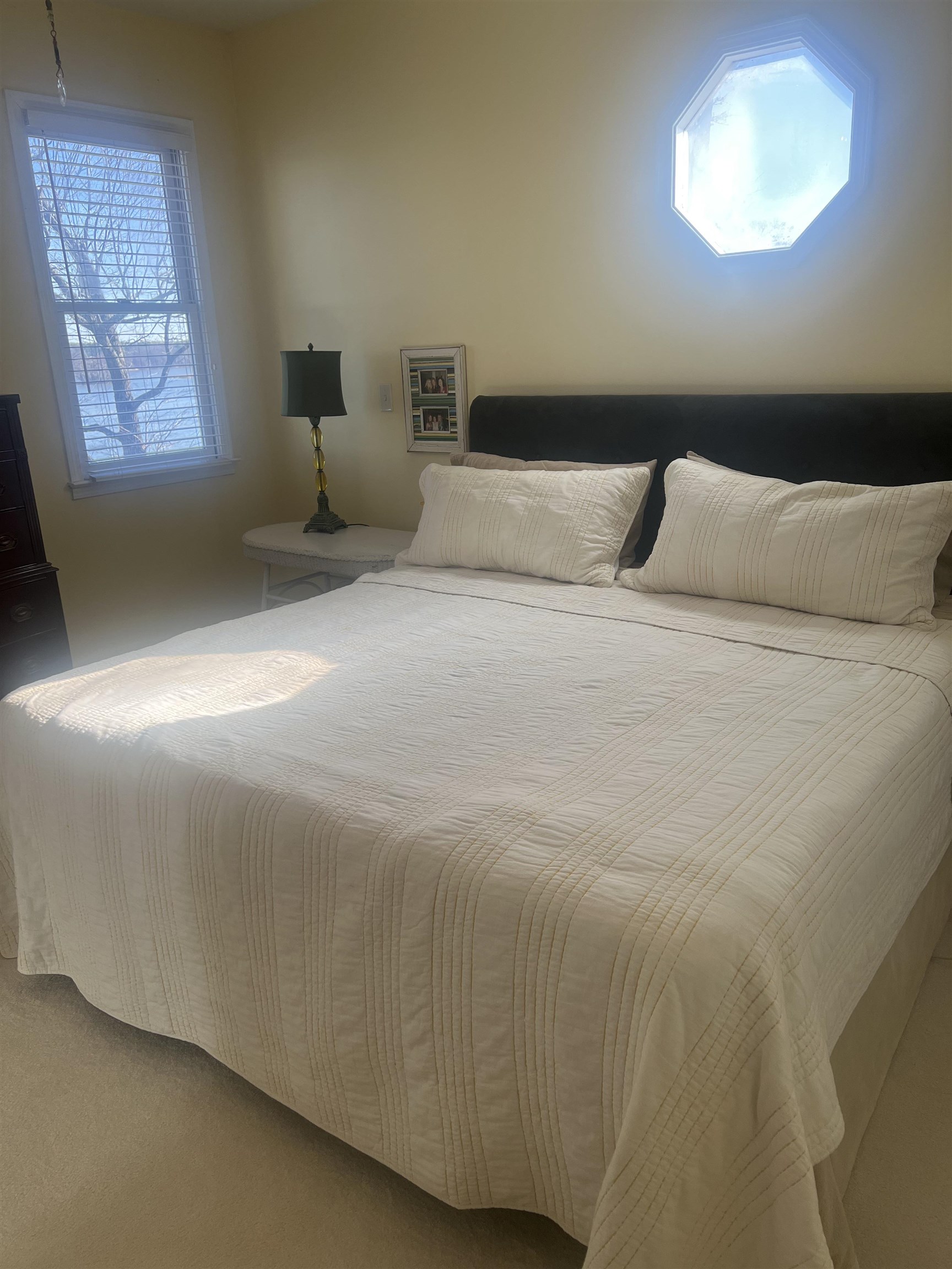 1101 Pride Estates Road Tuscumbia, AL 35674 - Photo 15 of 25 a bed room with a bed and a night stand