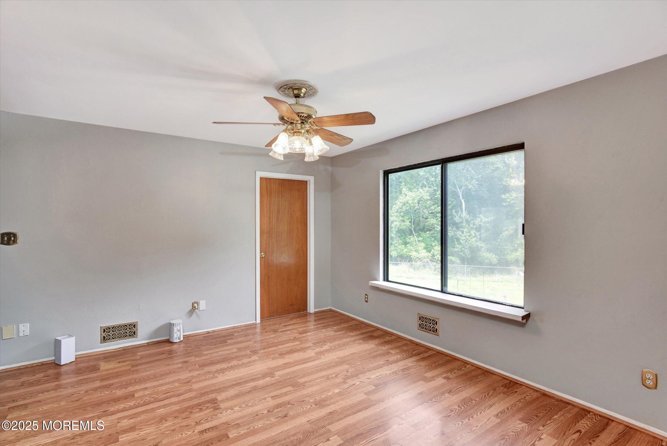 19 Northwoods Road Asbury Park, NJ 07712 - Photo 15 of 79 a view of an empty room with a window