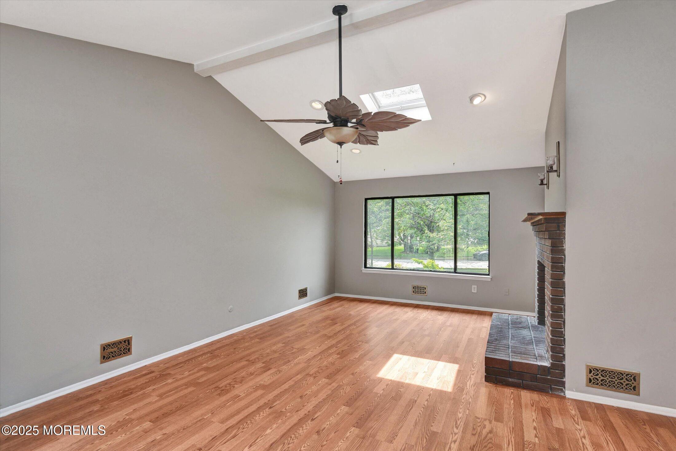 19 Northwoods Road Asbury Park, NJ 07712 - Photo 20 of 79 a view of room with window and ceiling fan