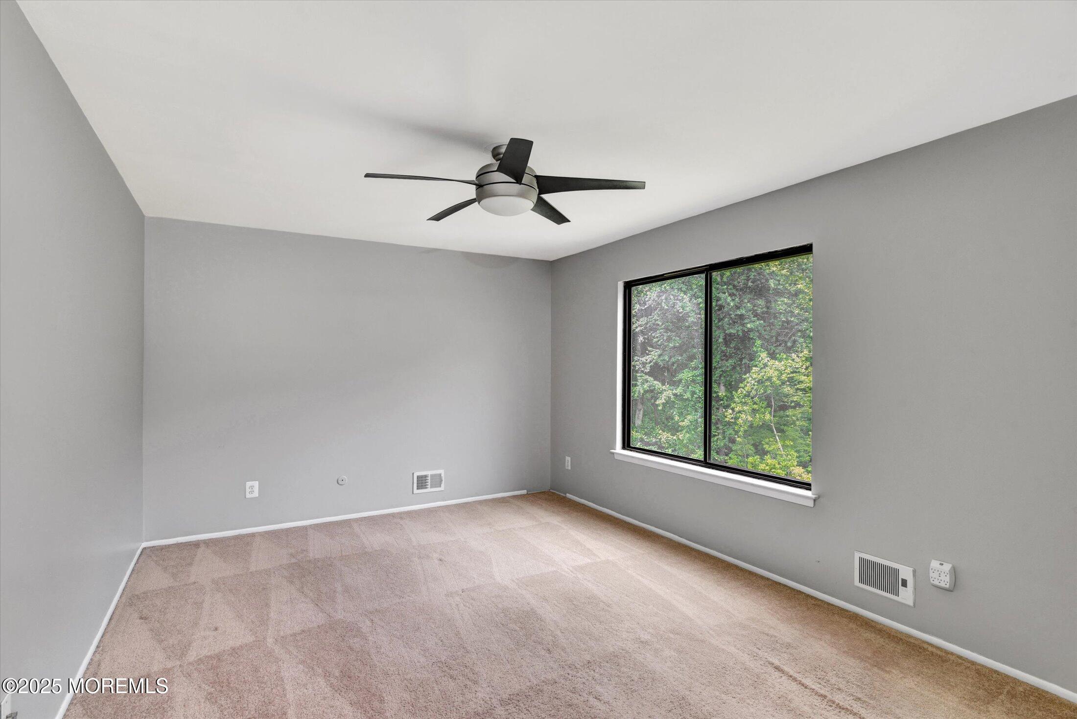 19 Northwoods Road Asbury Park, NJ 07712 - Photo 26 of 79 a view of an empty room with a window