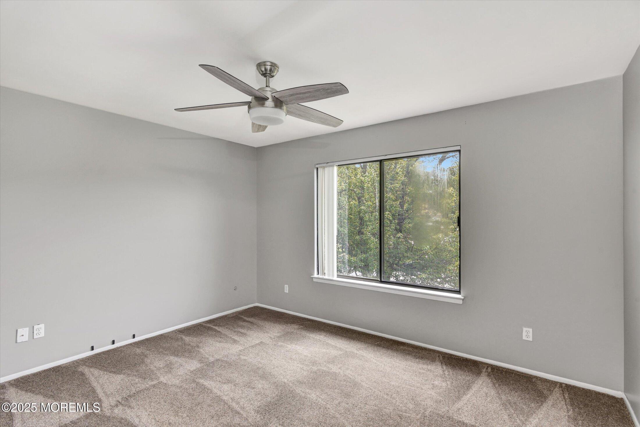 19 Northwoods Road Asbury Park, NJ 07712 - Photo 28 of 79 a view of an empty room with a window