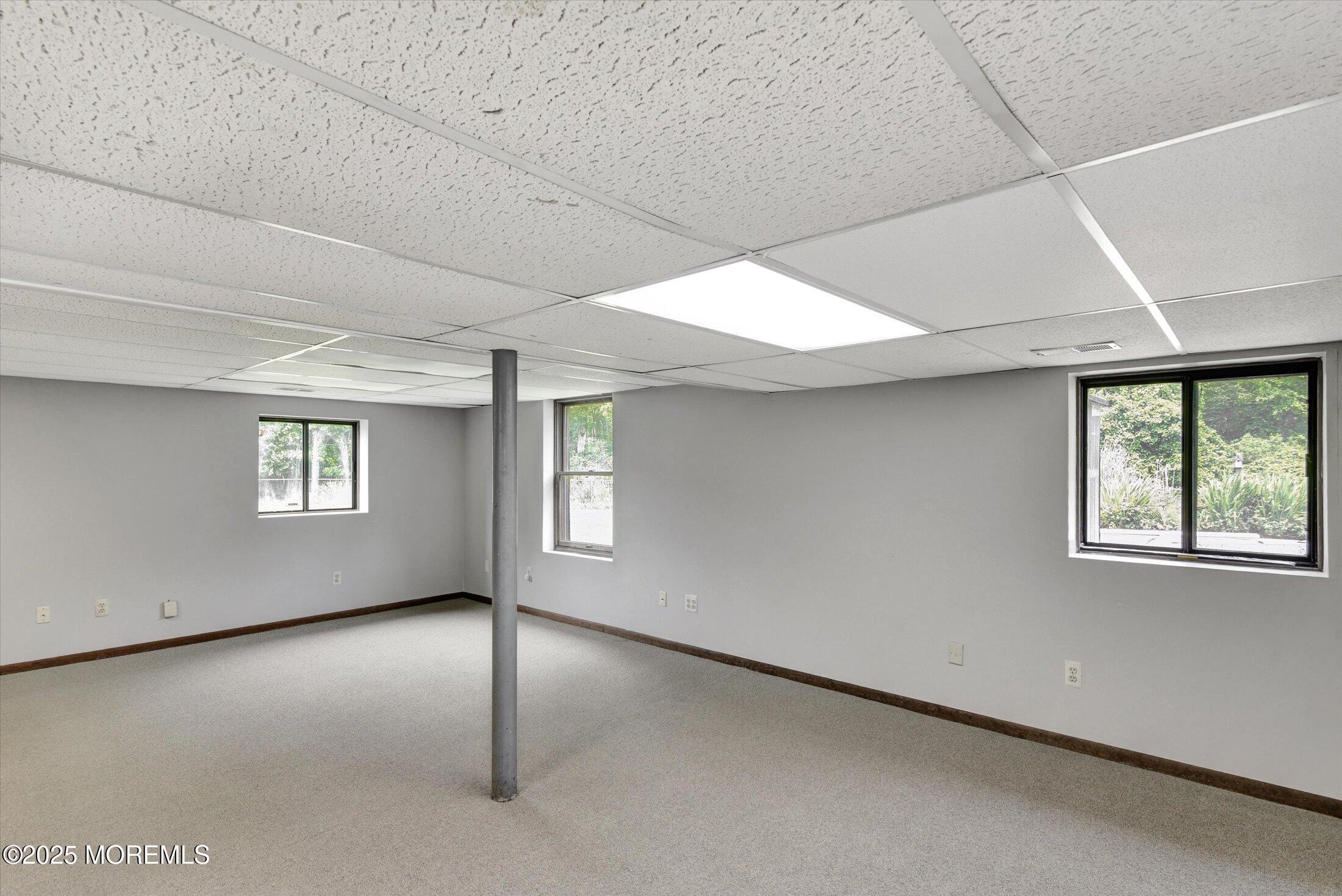 19 Northwoods Road Asbury Park, NJ 07712 - Photo 34 of 79 an empty room with windows