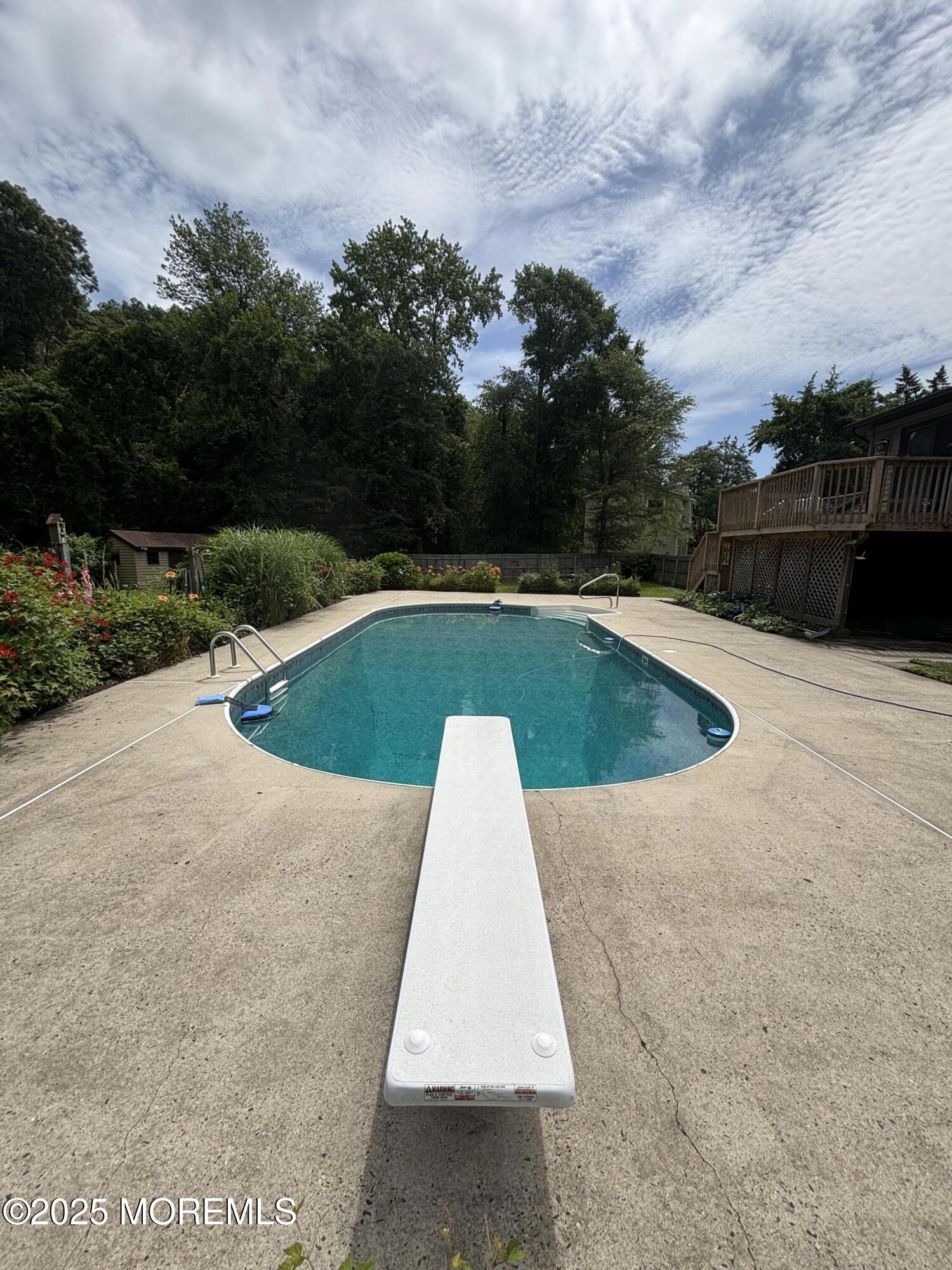 19 Northwoods Road Asbury Park, NJ 07712 - Photo 39 of 79 a view of swimming pool with a yard