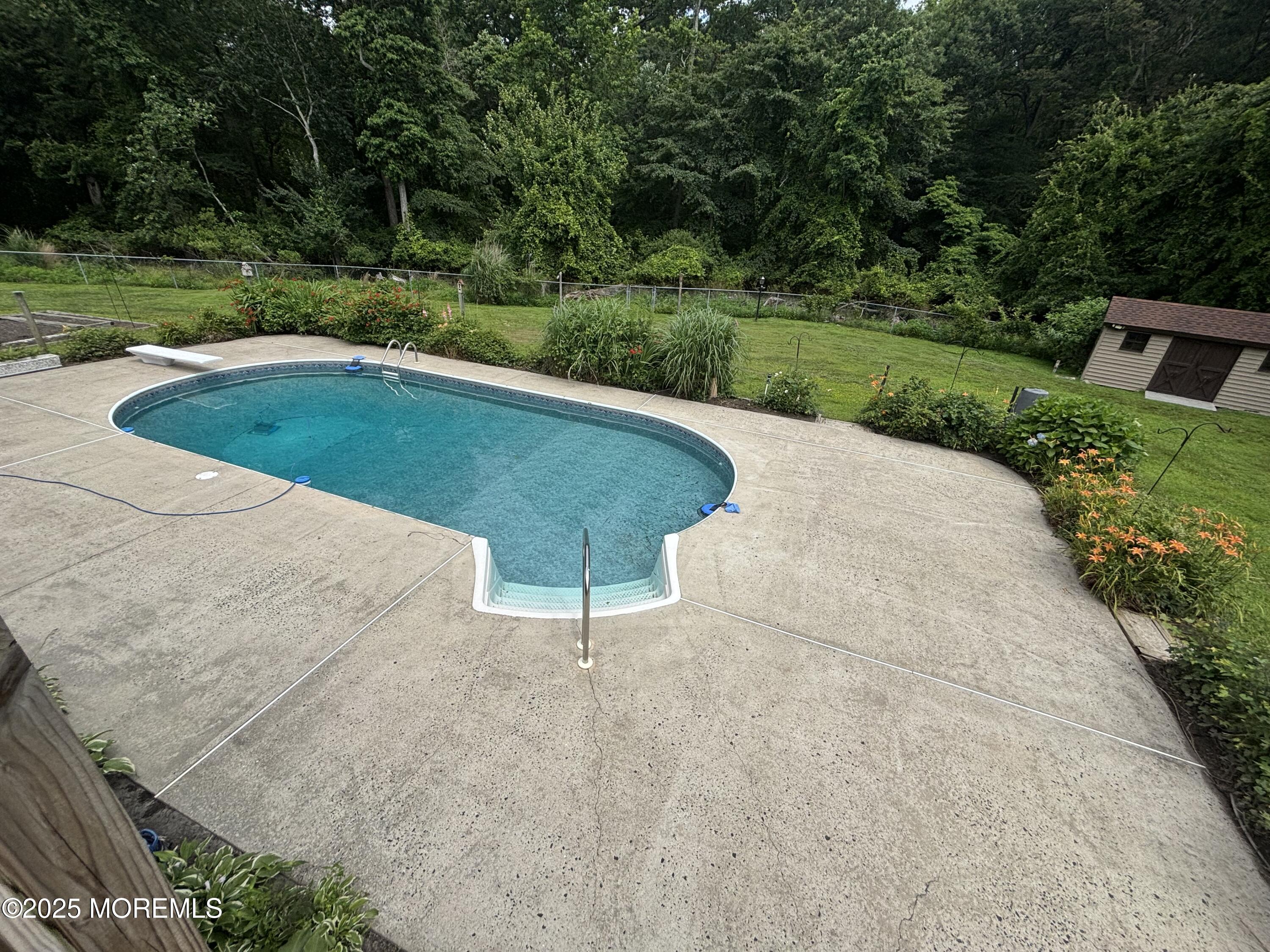 19 Northwoods Road Asbury Park, NJ 07712 - Photo 43 of 79 a view of outdoor space yard and swimming pool