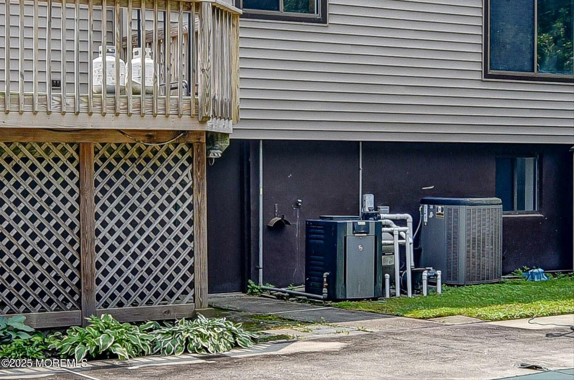 19 Northwoods Road Asbury Park, NJ 07712 - Photo 49 of 79 a front view of a house with a garden