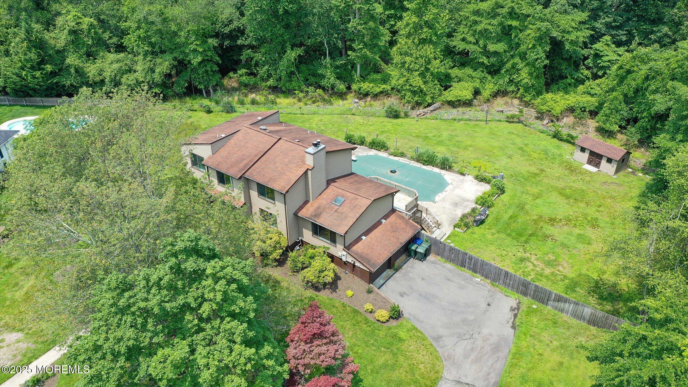 19 Northwoods Road Asbury Park, NJ 07712 - Photo 61 of 79 an aerial view of a house with garden space and street view