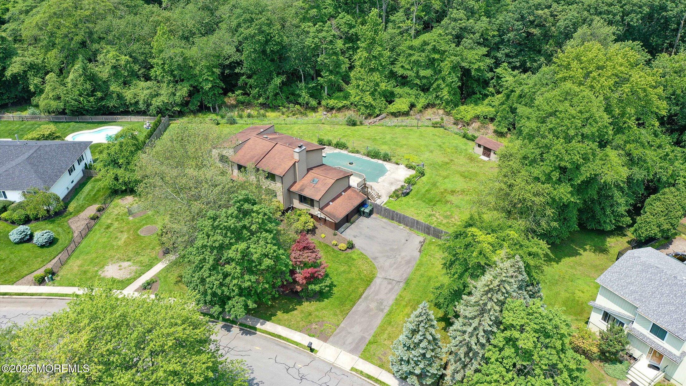 19 Northwoods Road Asbury Park, NJ 07712 - Photo 64 of 79 an aerial view of a house with yard swimming pool and outdoor seating