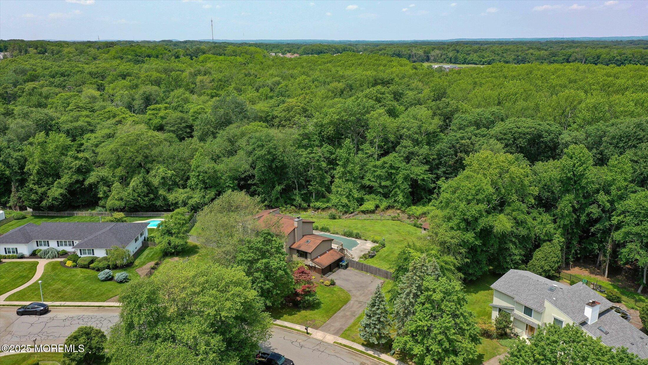 19 Northwoods Road Asbury Park, NJ 07712 - Photo 65 of 79 an aerial view of a house with a yard
