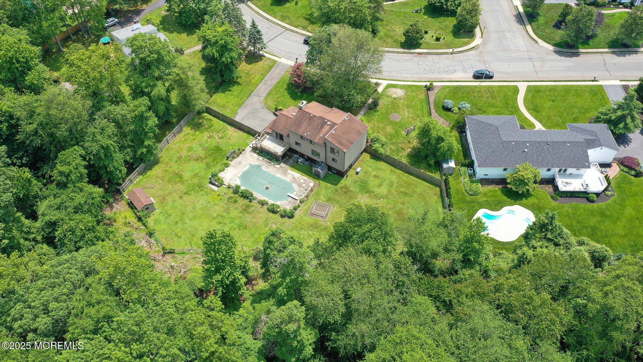 19 Northwoods Road Asbury Park, NJ 07712 - Photo 72 of 79 an aerial view of a house with a garden
