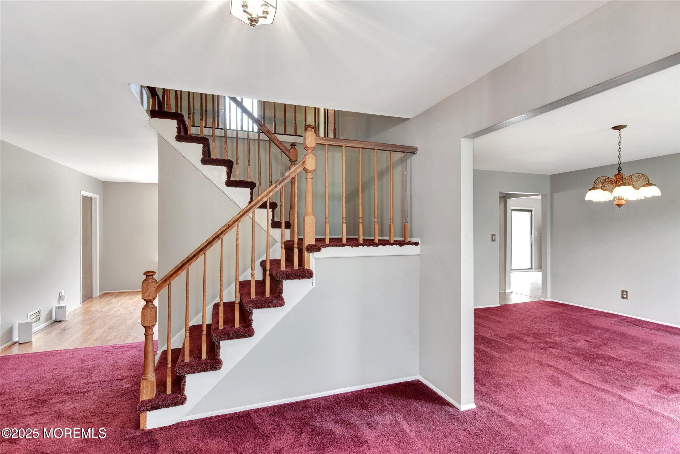 19 Northwoods Road Asbury Park, NJ 07712 - Photo 8 of 79 a view of entryway and hall with wooden floor