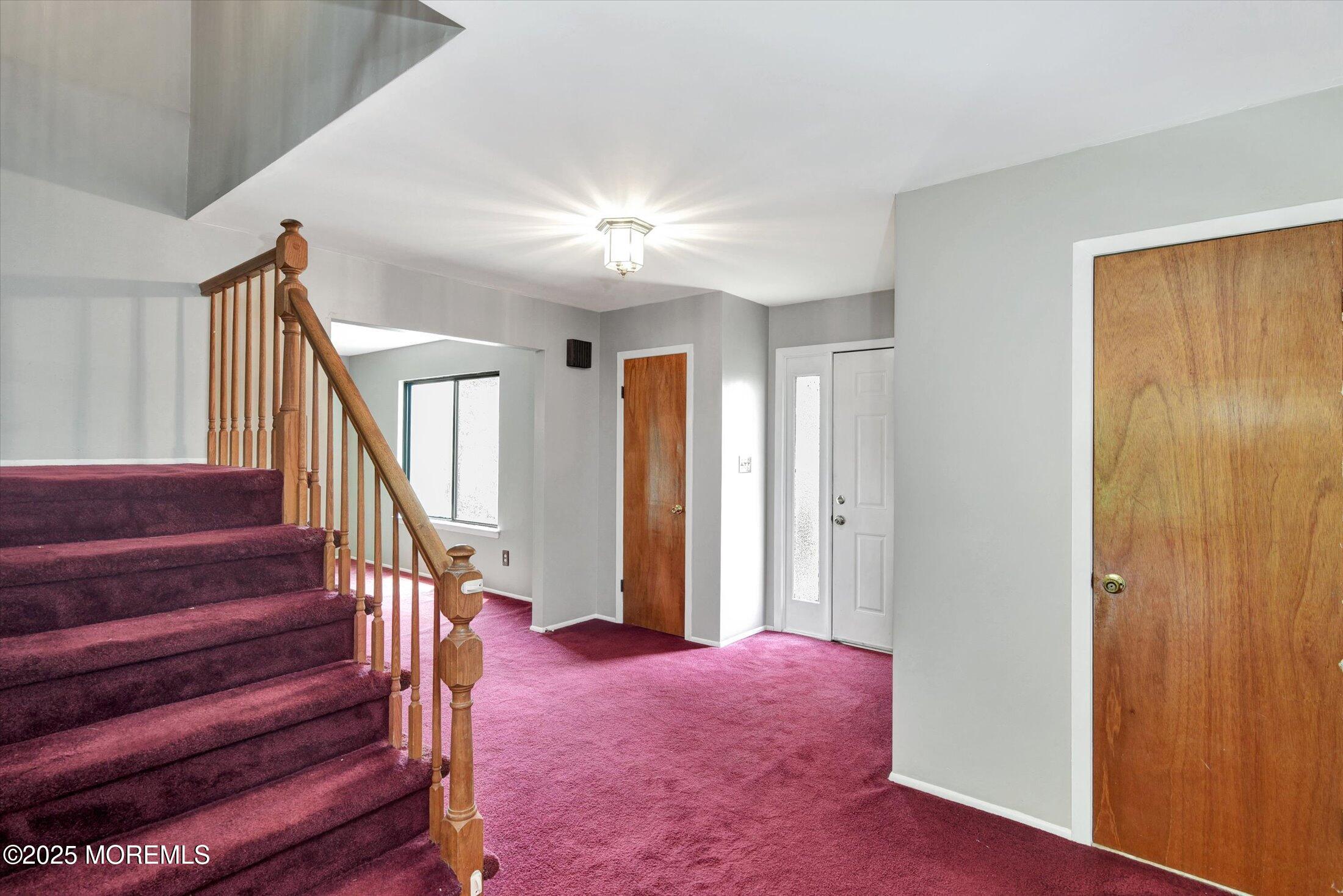 19 Northwoods Road Asbury Park, NJ 07712 - Photo 9 of 79 a view of entryway and hall with wooden floor