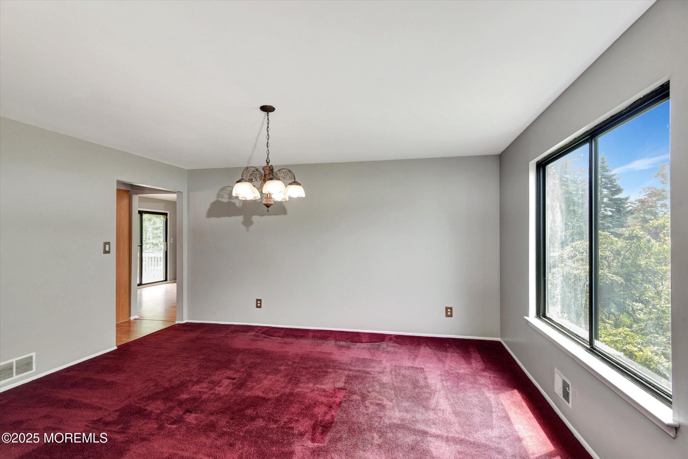 19 Northwoods Road Asbury Park, NJ 07712 - Photo 10 of 79 a view of a room with window and ceiling fan