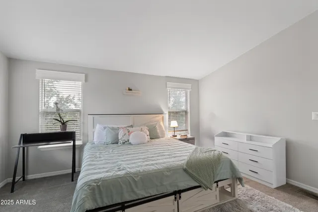 a black and white photo of a living room