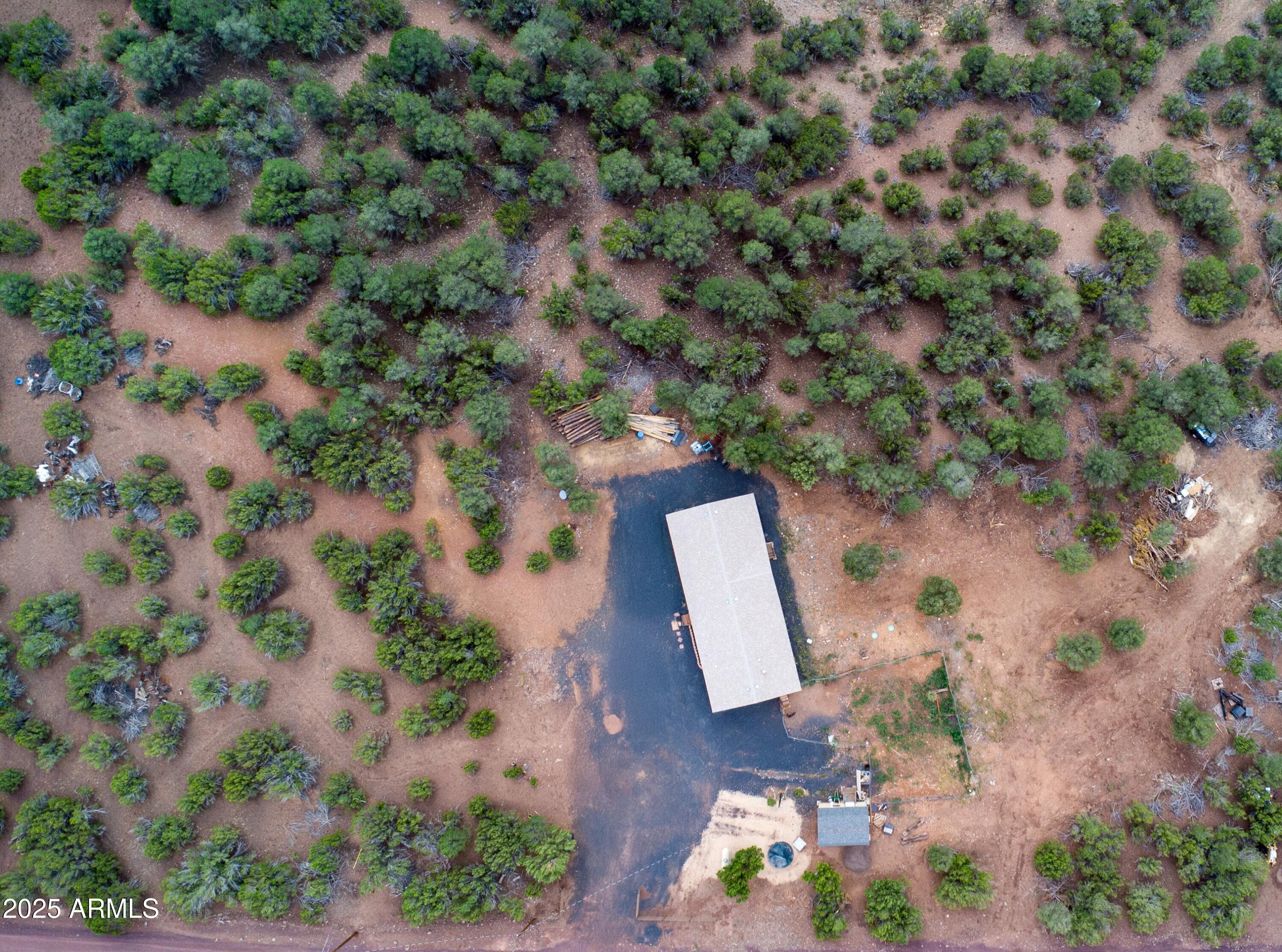 65 Co Road Show Low, AZ 85901 - Photo 33 of 38 an aerial view of a house with a yard