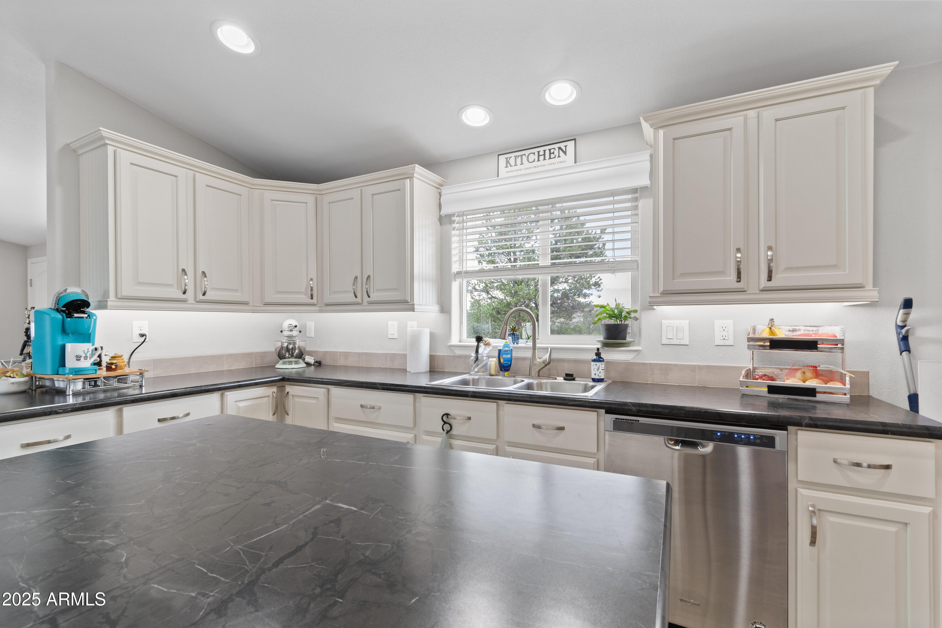 65 Co Road Show Low, AZ 85901 - Photo 9 of 38 a kitchen with granite countertop a sink a stove and cabinets