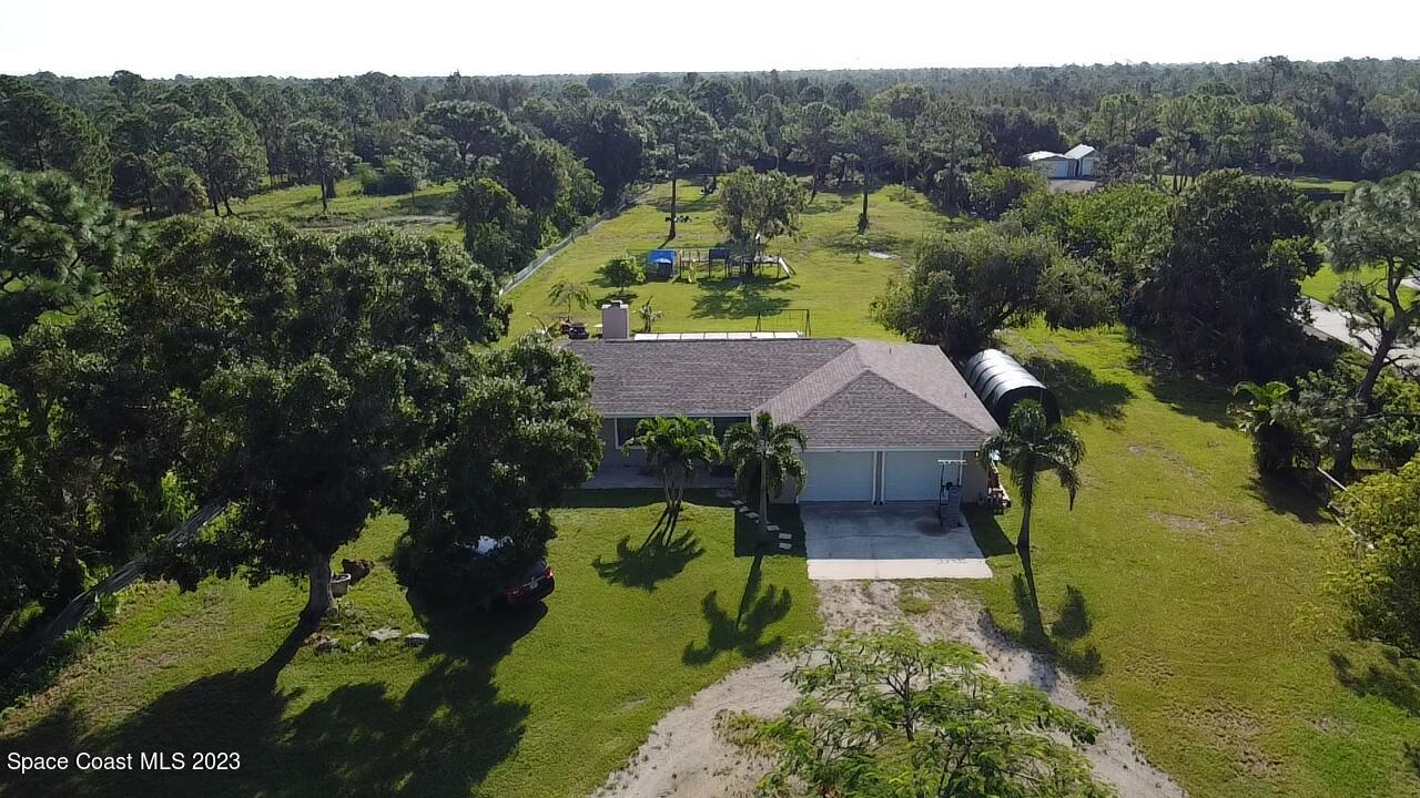 2745 Corey Road Malabar, FL 32950 - Photo 23 of 39 an aerial view of a house