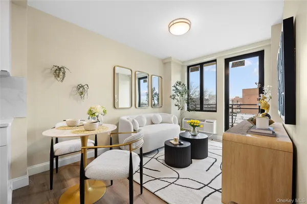 a living room with furniture and a window
