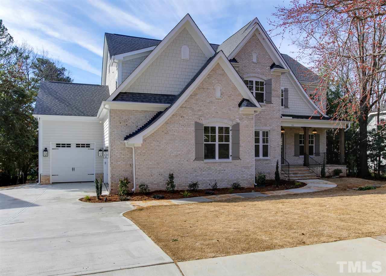 701 Shelley Road Raleigh, NC 27609 - Photo 2 of 25 a front view of a house with a yard