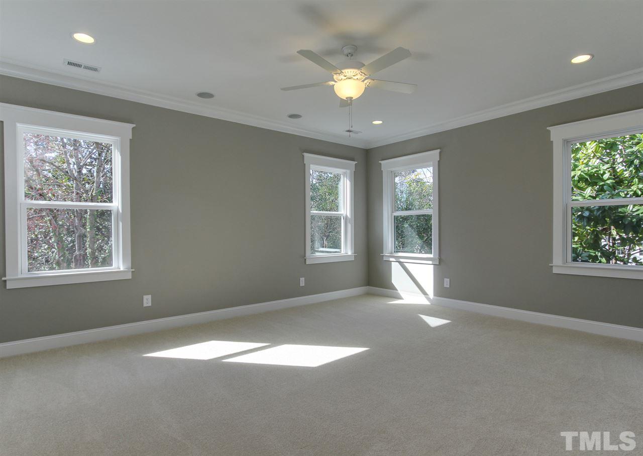 701 Shelley Road Raleigh, NC 27609 - Photo 16 of 25 a view of an empty room with a window