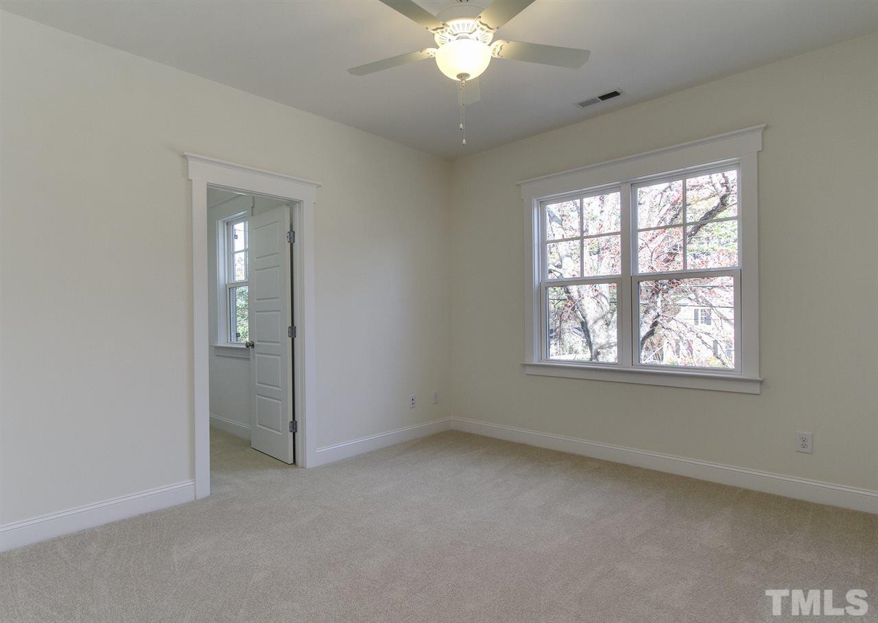 701 Shelley Road Raleigh, NC 27609 - Photo 21 of 25 a view of an empty room with a window