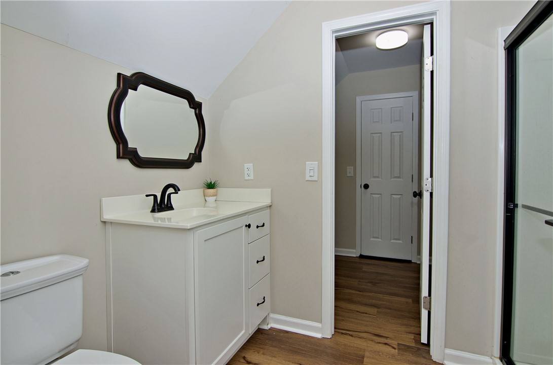 7893 Athens Road Carnesville, GA 30521 - Photo 29 of 50 This bright bathroom offers a modern vanity and sleek fixtures for comfortable daily routines.