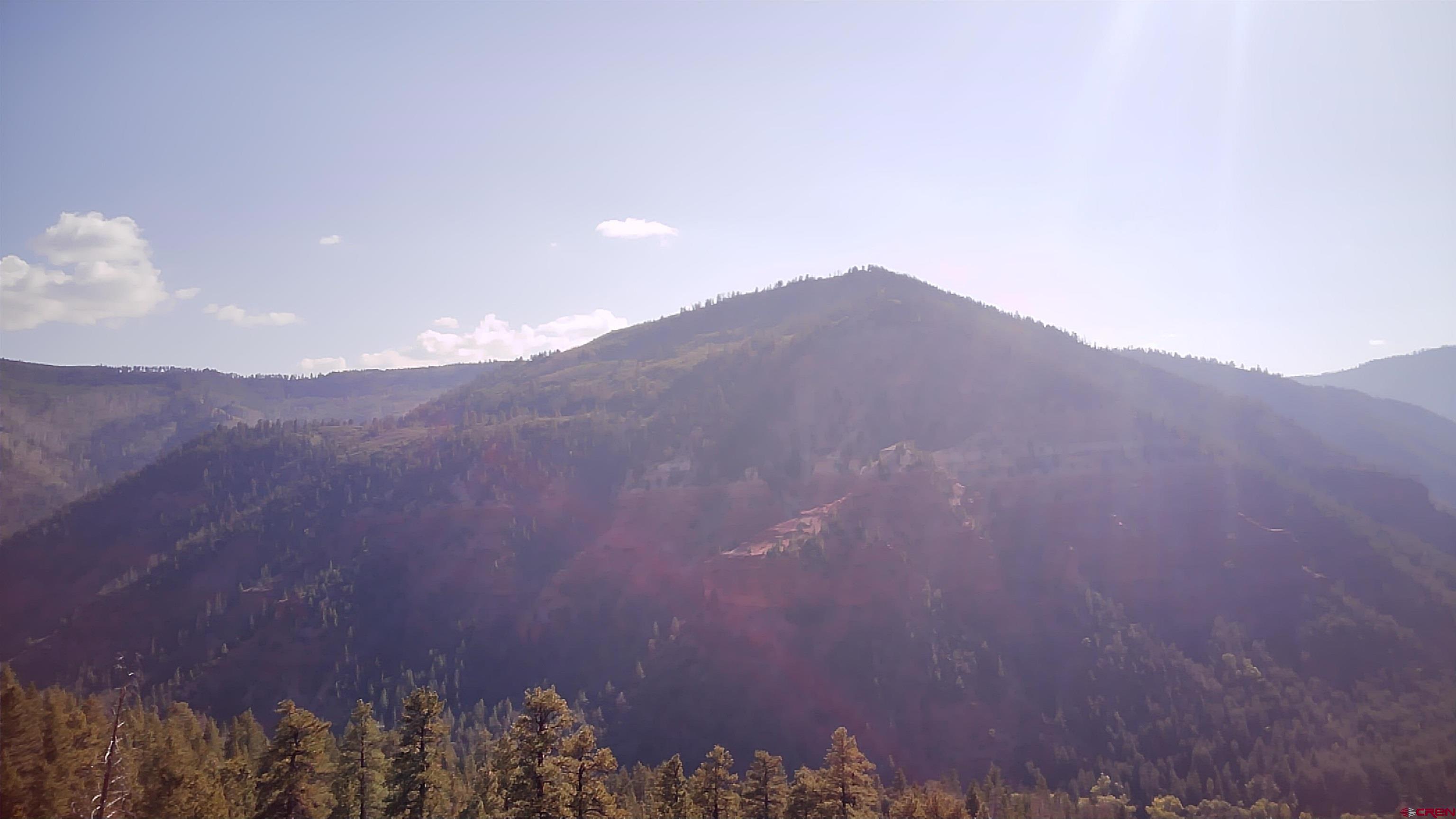 58p 58P Road Placerville, CO 81430 - Photo 32 of 34 a view of a house with a mountain in the background