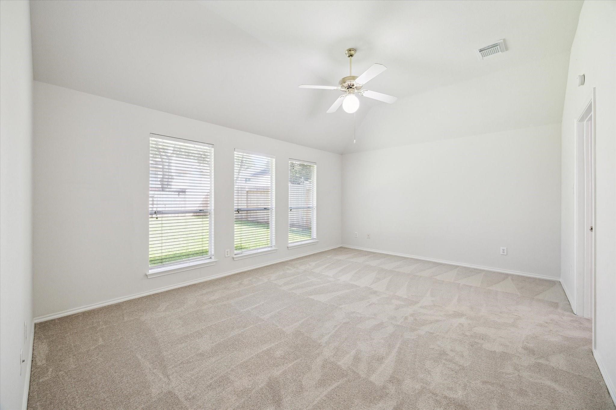 8211 Broken Timber Way Houston, TX 77095 - Photo 13 of 15 a view of an empty room with a window