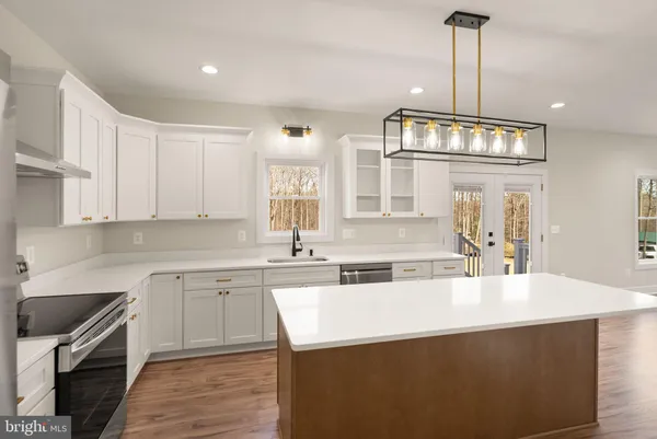 a view of an empty room with a sink