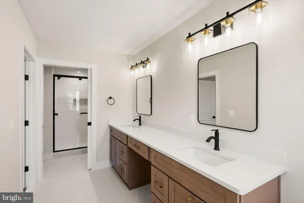 a view of an empty room and wooden floor