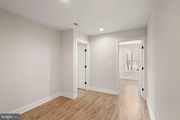 a view of a house with wooden deck