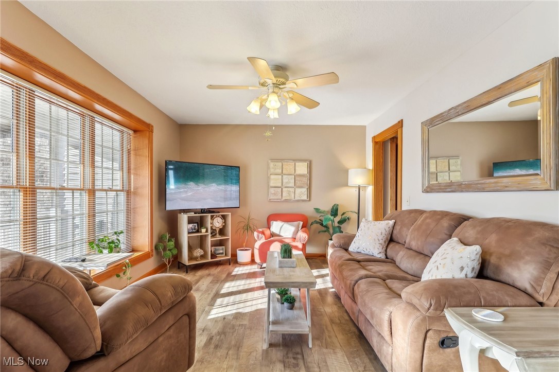 3353 Jens Way Perry, OH 44081 - Photo 11 of 49 Living room featuring wood-type flooring and ceiling fan