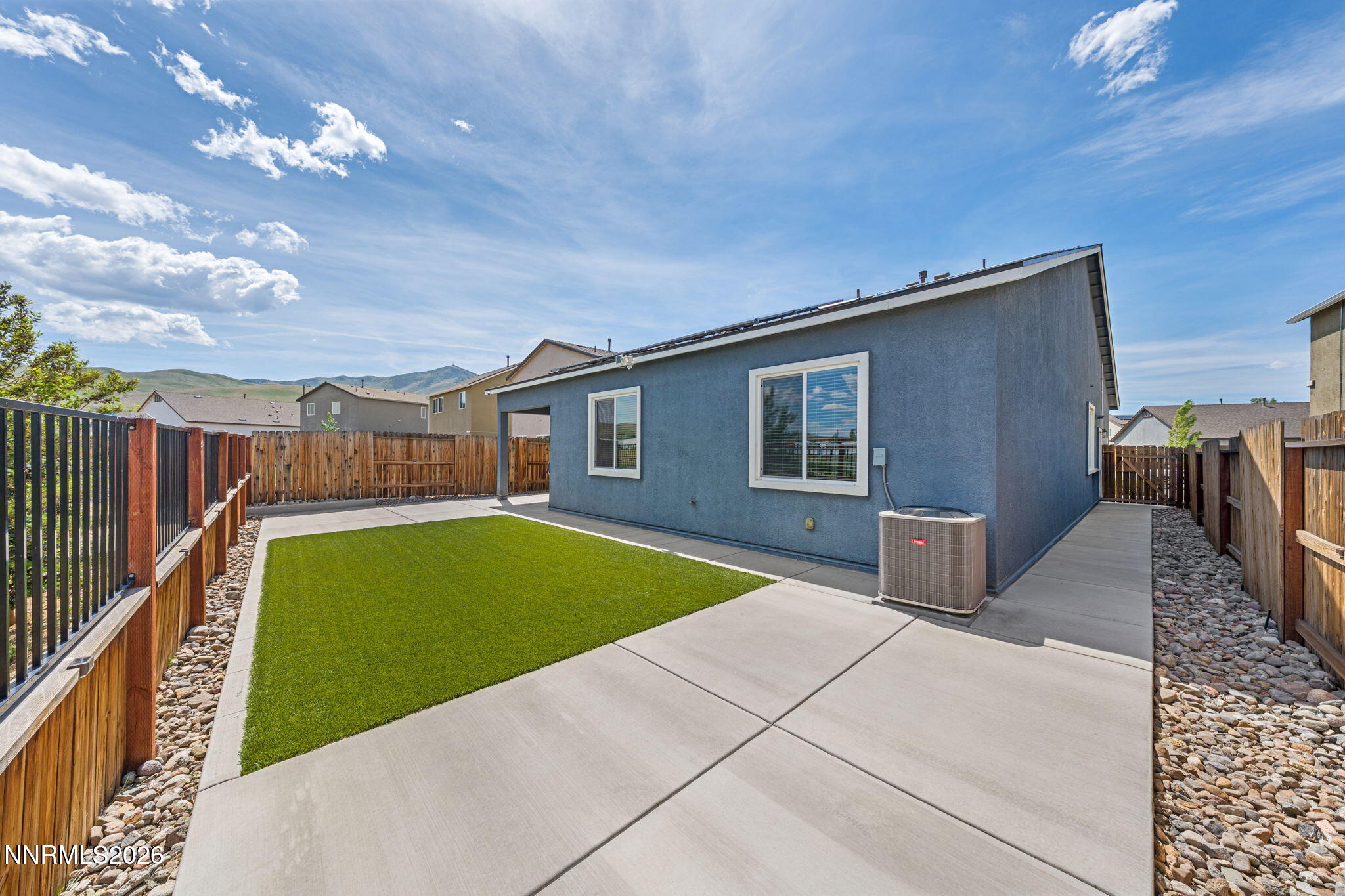 9708 Sea Glass Drive Reno, NV 89506 - Photo 41 of 51 a house view with a backyard space