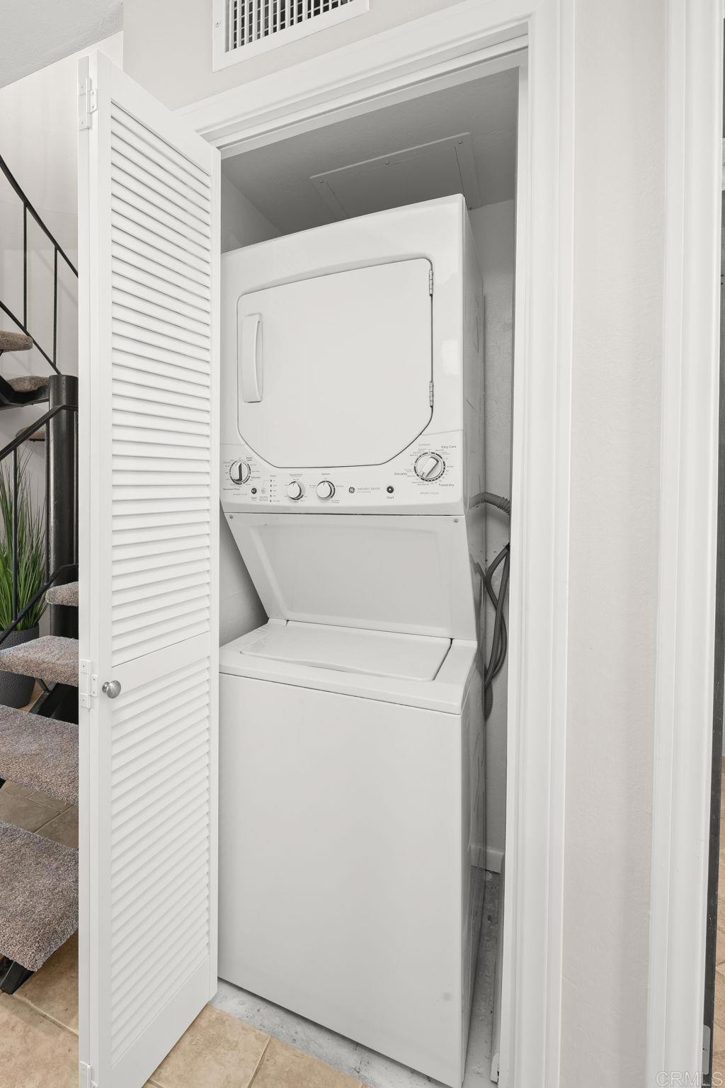 1939 Alga Road, Unit A Carlsbad, CA 92009 - Photo 30 of 32 a utility room with dryer and washer