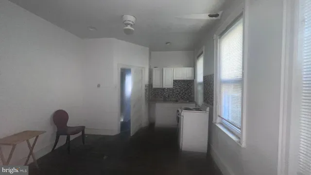 a view of empty room with windows