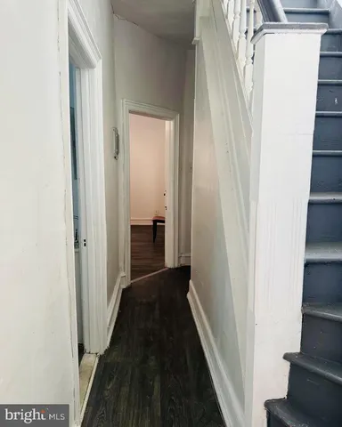 a kitchen with stainless steel appliances granite countertop a stove a cabinets and a refrigerator