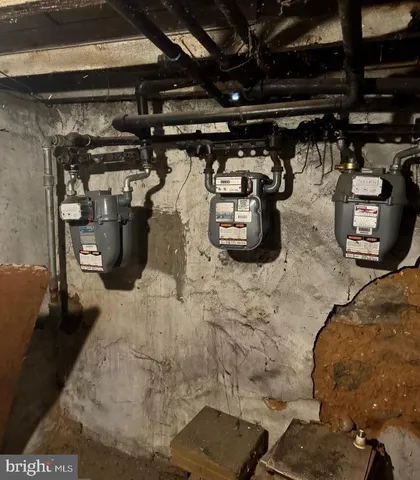 a bathroom with a granite countertop sink and a stove