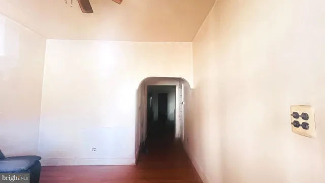 a view of a room with a hallway