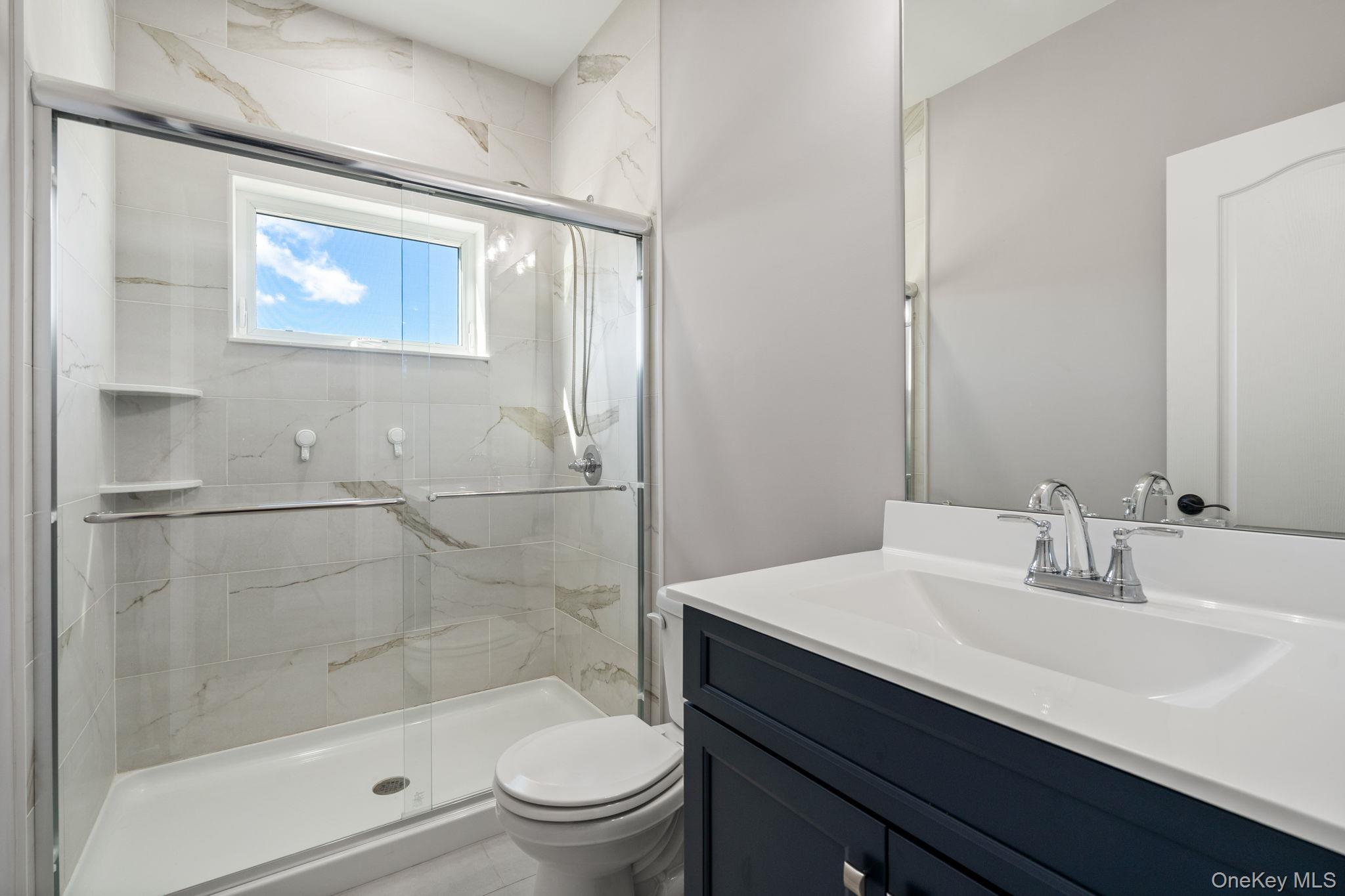 10 Harrier Ridge Drive Wallkill, NY 12589 - Photo 19 of 46 Full bath featuring vanity and a marble finish shower