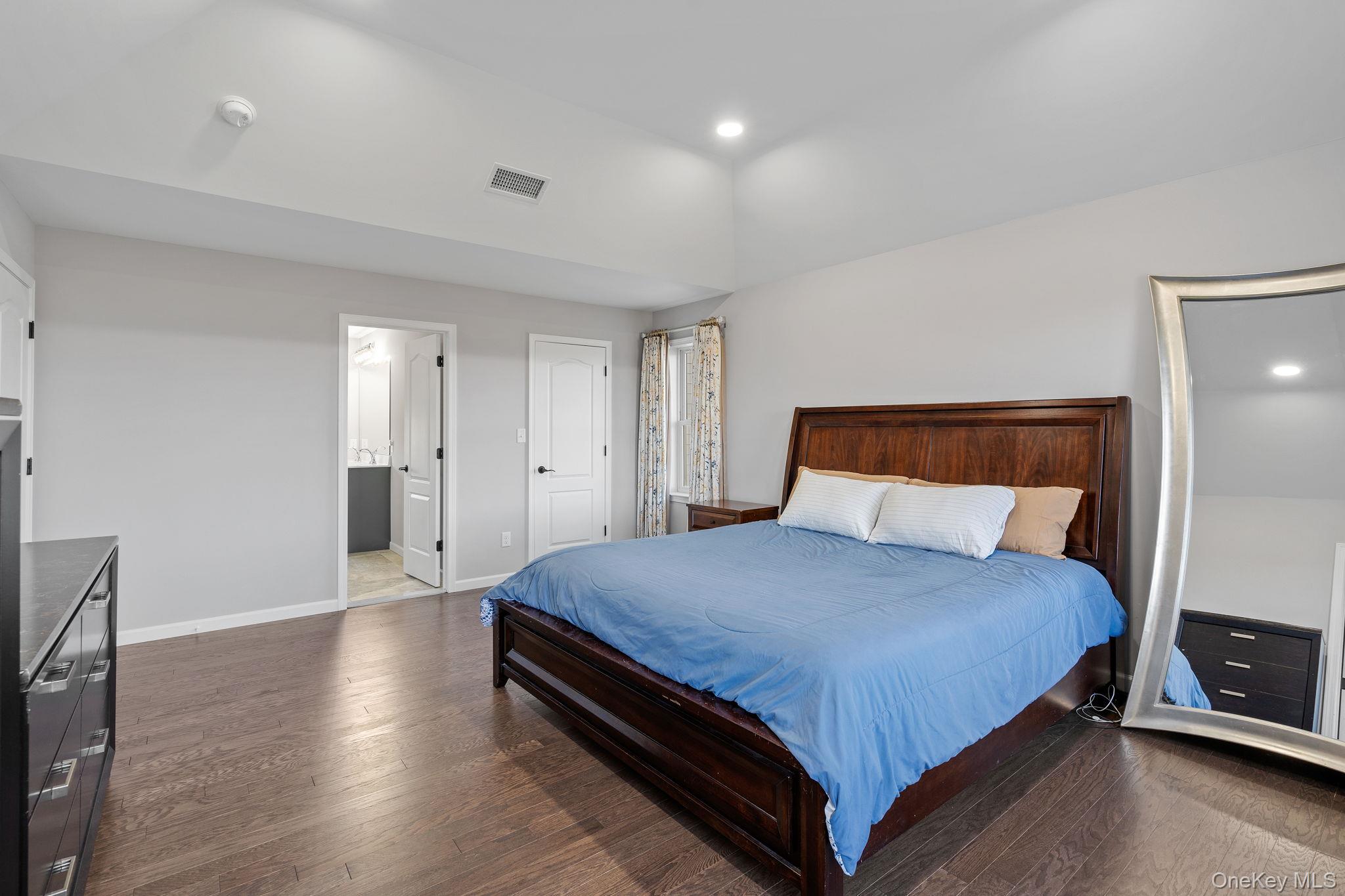 10 Harrier Ridge Drive Wallkill, NY 12589 - Photo 24 of 46 Bedroom with dark wood-type flooring and recessed lighting