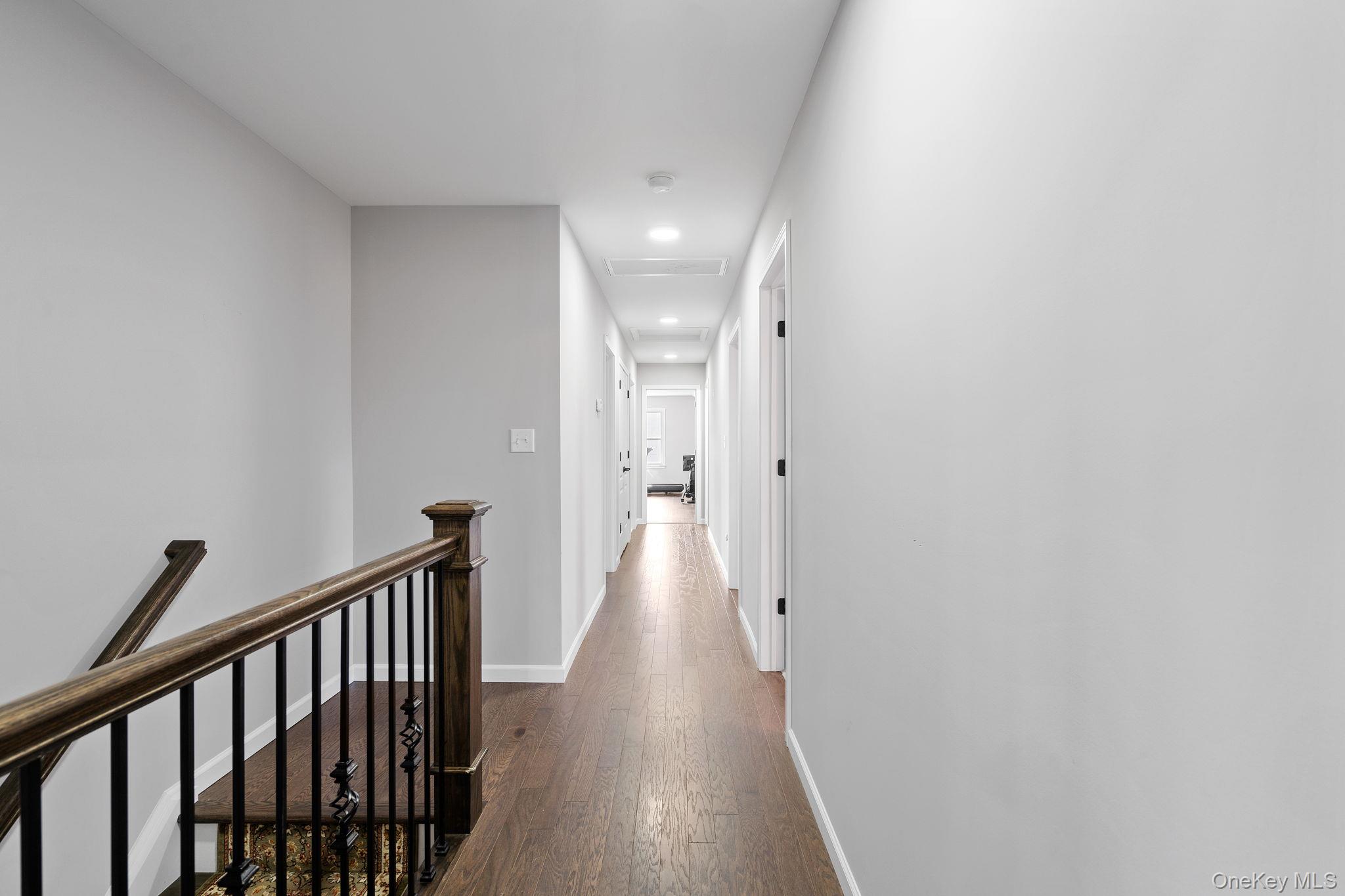 10 Harrier Ridge Drive Wallkill, NY 12589 - Photo 27 of 46 Hall featuring an upstairs landing, recessed lighting, and dark wood-style flooring