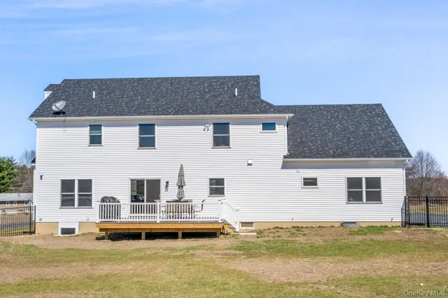 a house view with a swimming pool