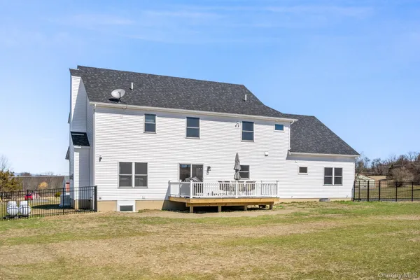 a view of a house with a swimming pool