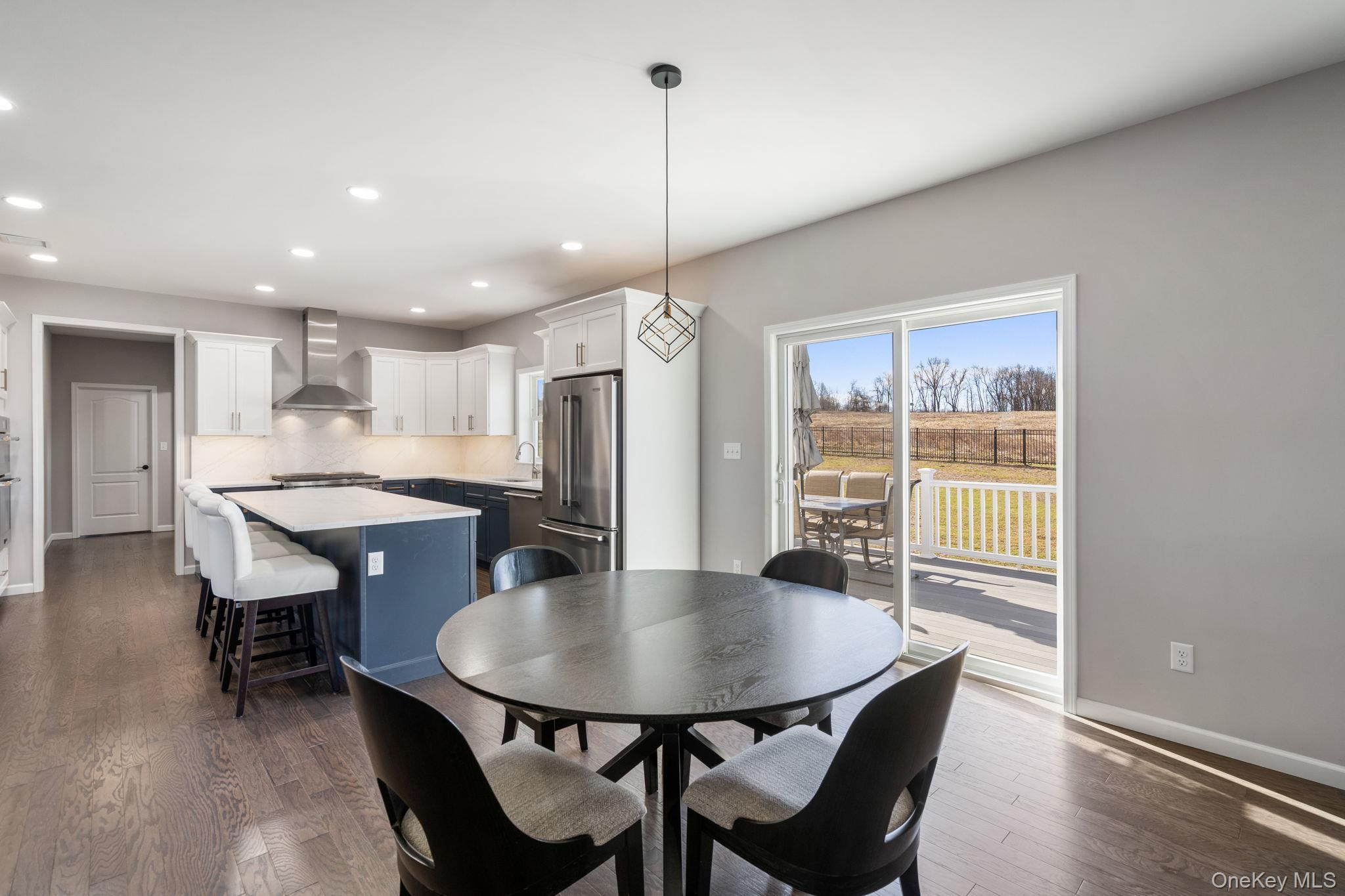 10 Harrier Ridge Drive Wallkill, NY 12589 - Photo 9 of 46 Dining area with recessed lighting and dark wood-style floors