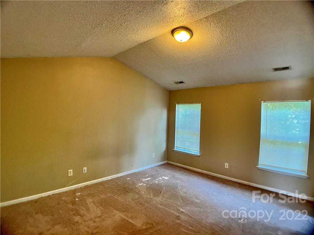 2005 Pimpernel Road Charlotte, NC 28213 - Photo 15 of 24 a view of an empty room with a window