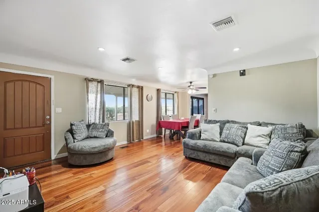 a living room with furniture and a couch