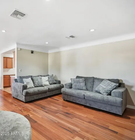 a kitchen with stainless steel appliances granite countertop a stove and cabinets
